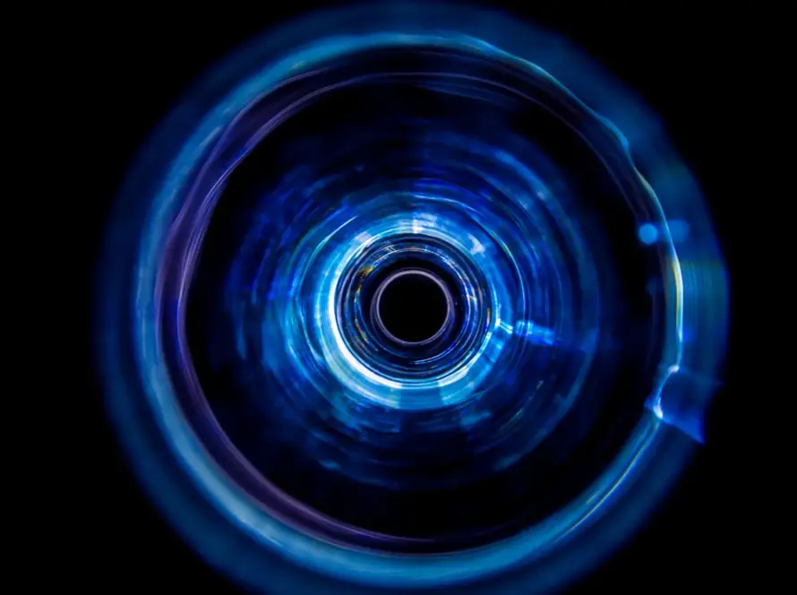 Blue electric looking rings that depict and eye in the centre representing hypnosis